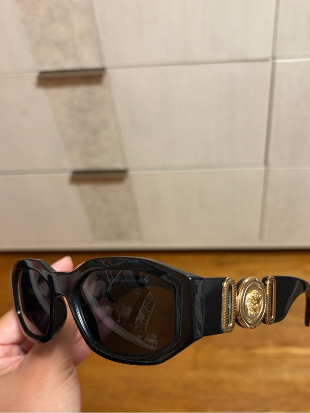 Black Women's Sunglasses with Gold Medallion Accent